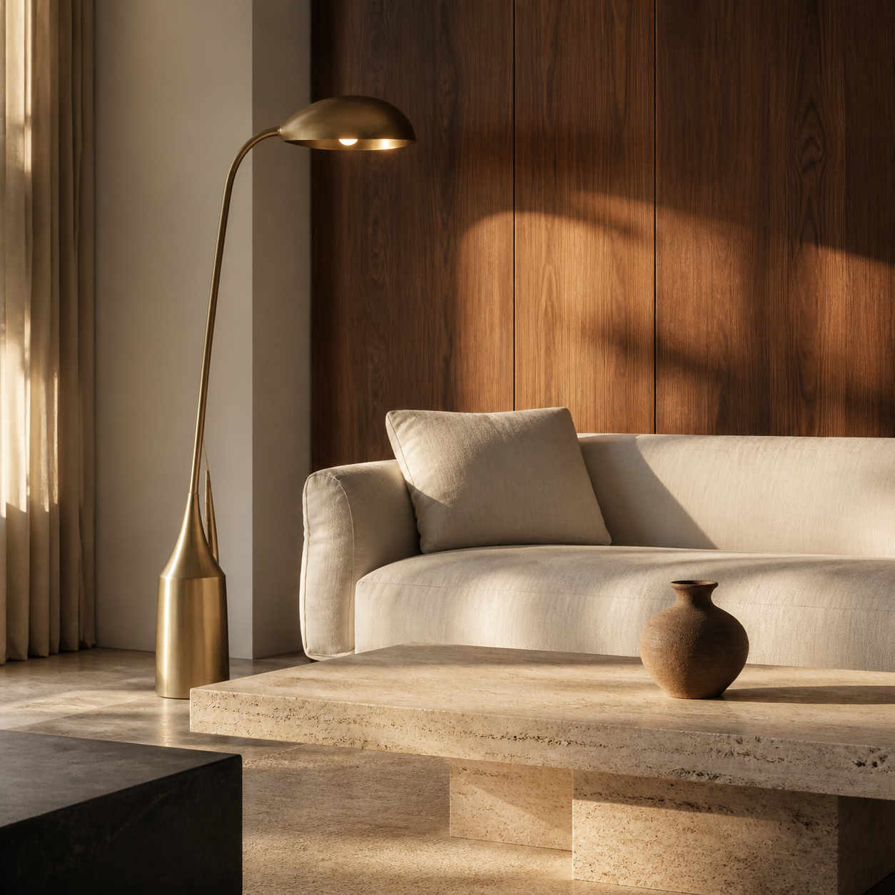 A living room lit by warm pendant light